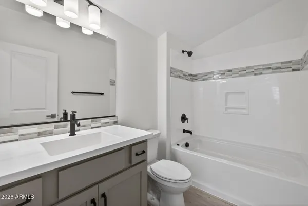 an aerial view of a house with a ocean view