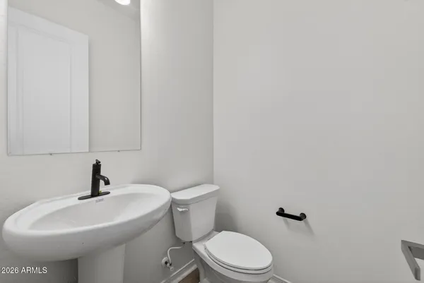 an aerial view of residential building and lake