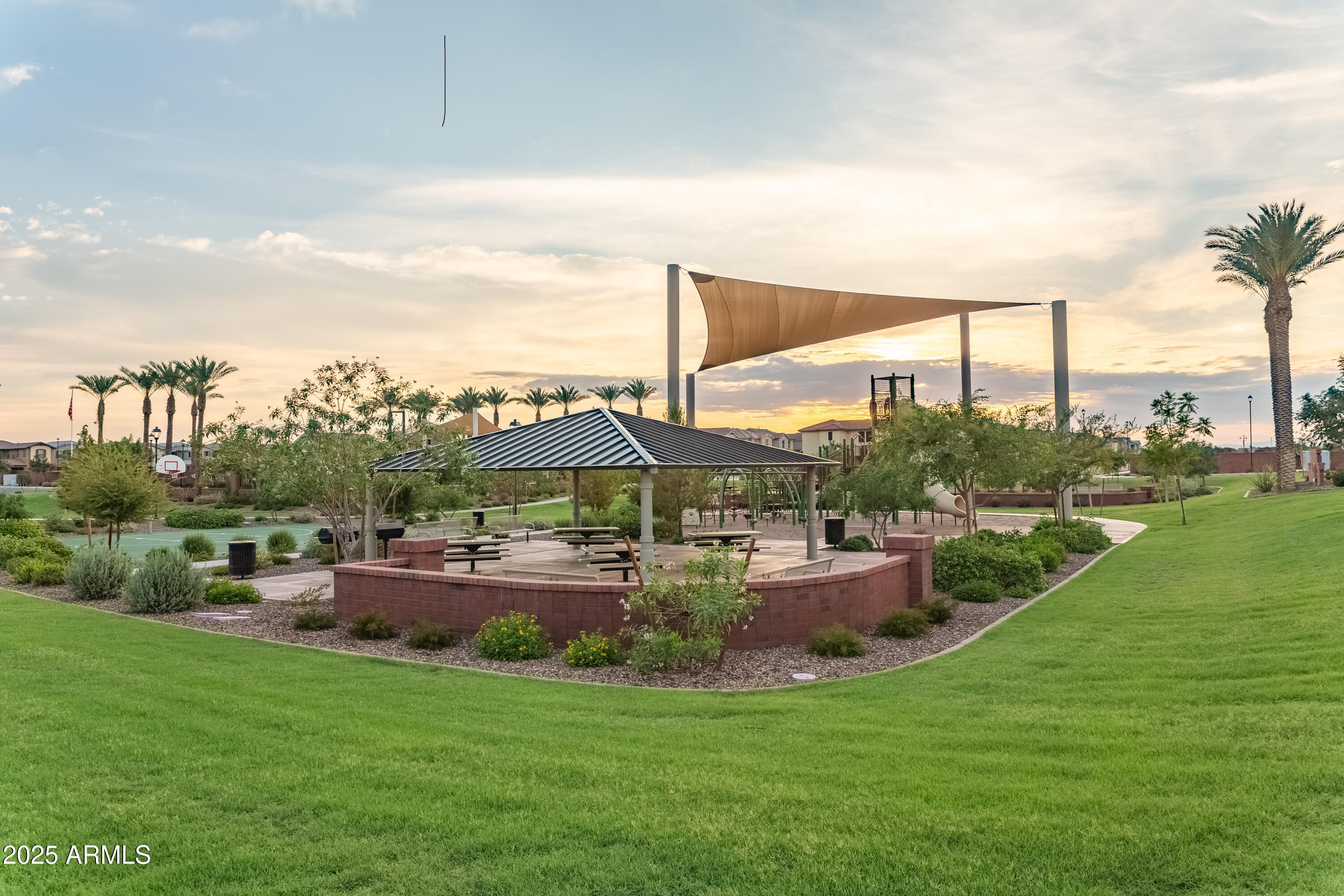 4273 East John Street Gilbert, AZ 85295 - Photo 6 of 29 a view of a house with a yard and lake view