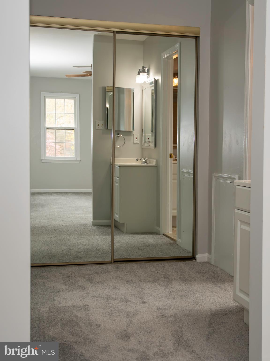 8402 Reflection Lane Vienna, VA 22182 - Photo 16 of 24 Master Bedroom Closet Area