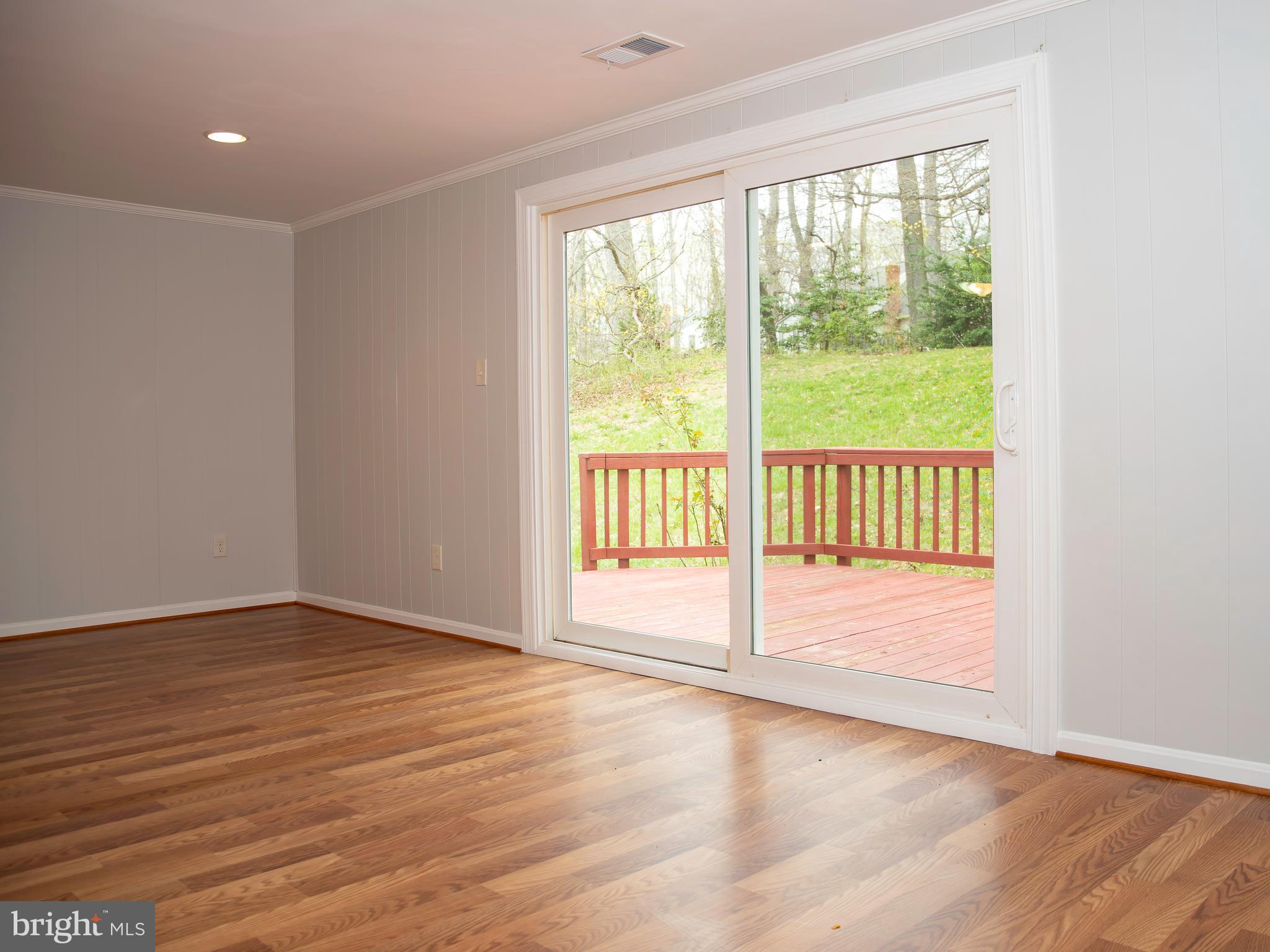 8402 Reflection Lane Vienna, VA 22182 - Photo 18 of 24 Family Room - leading to backyard / deck