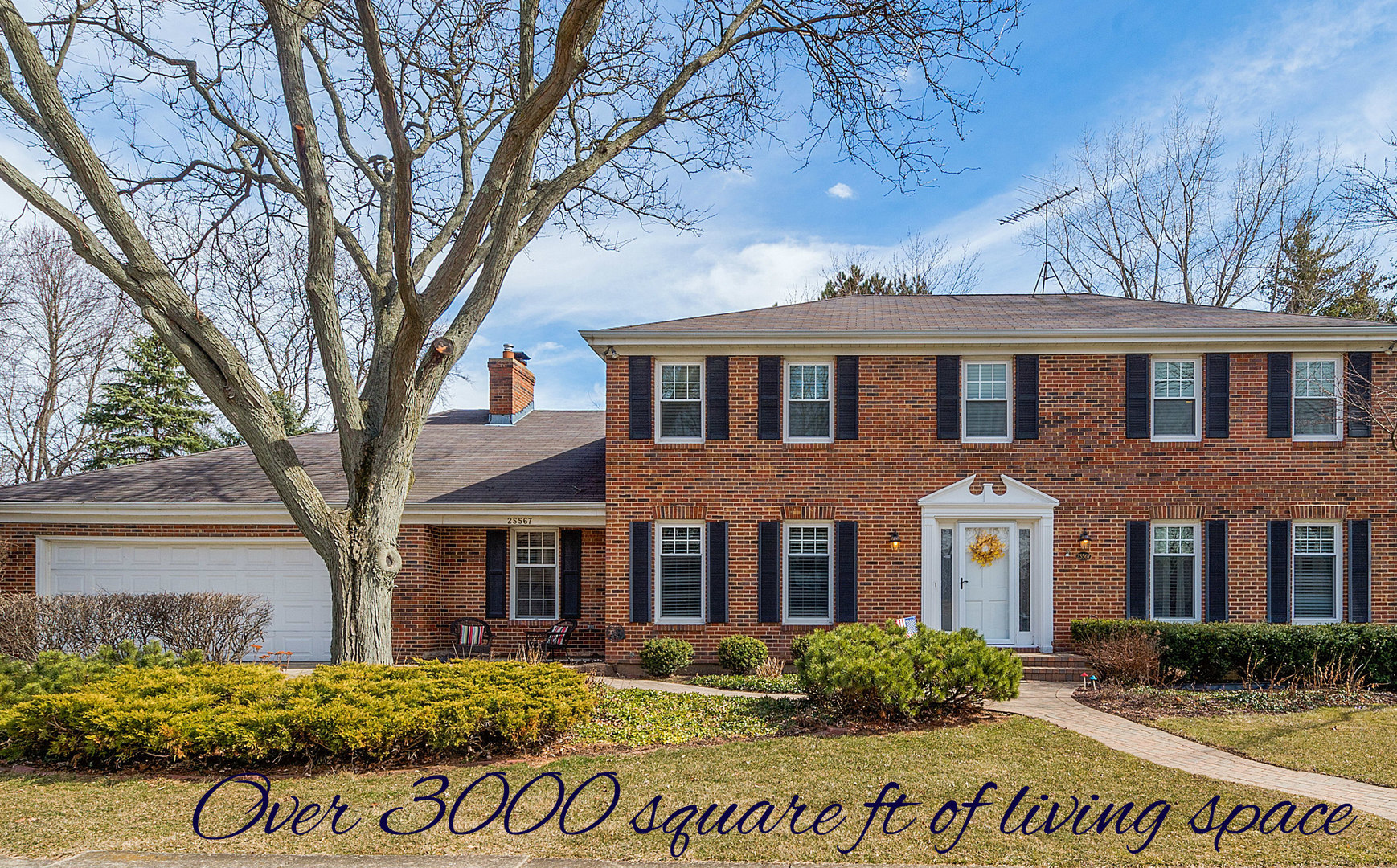 2S567 White Birch Lane Wheaton, IL 60189 - Photo 1 of 31 a front view of a house with garden