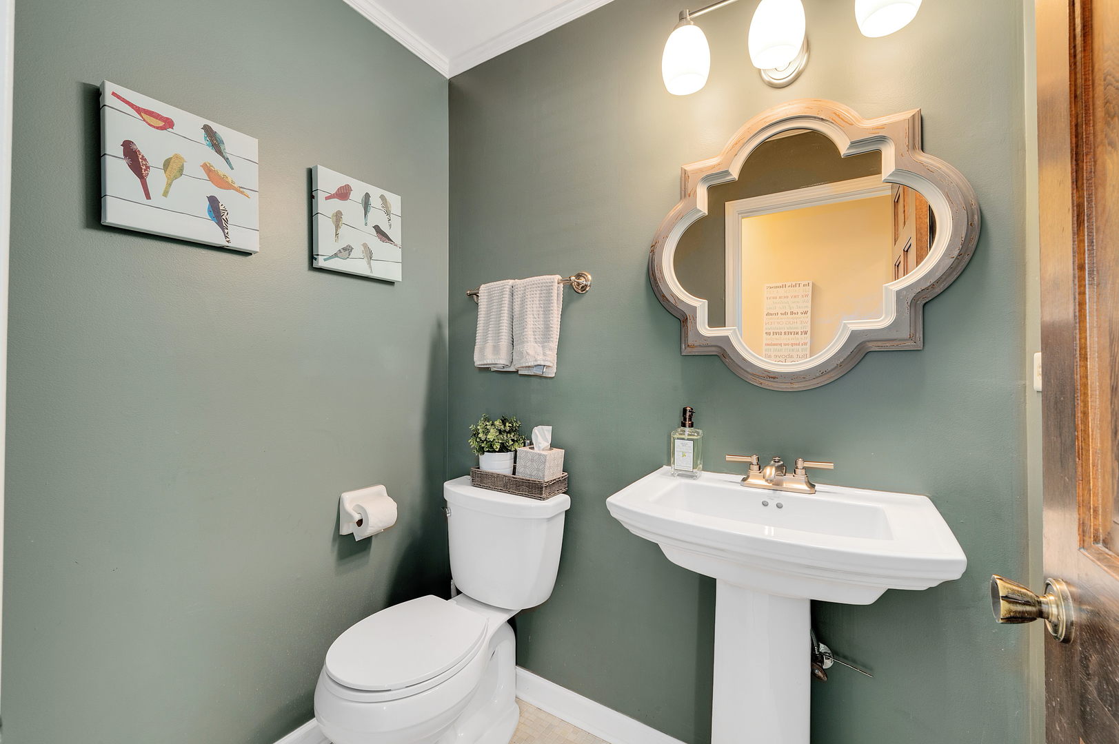 2S567 White Birch Lane Wheaton, IL 60189 - Photo 16 of 31 a bathroom with a toilet sink and mirror