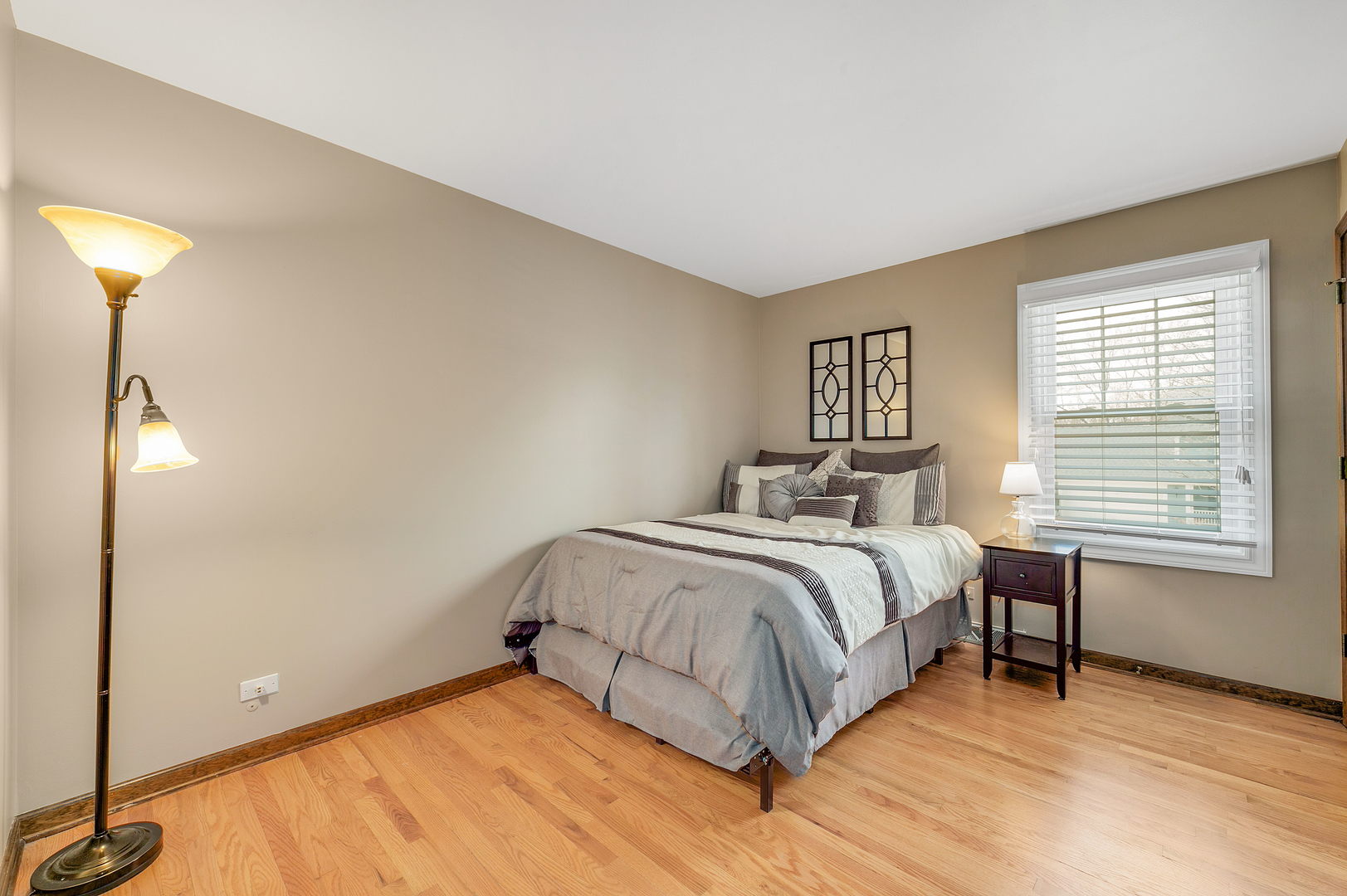 2S567 White Birch Lane Wheaton, IL 60189 - Photo 19 of 31 a spacious bedroom with a bed and a window