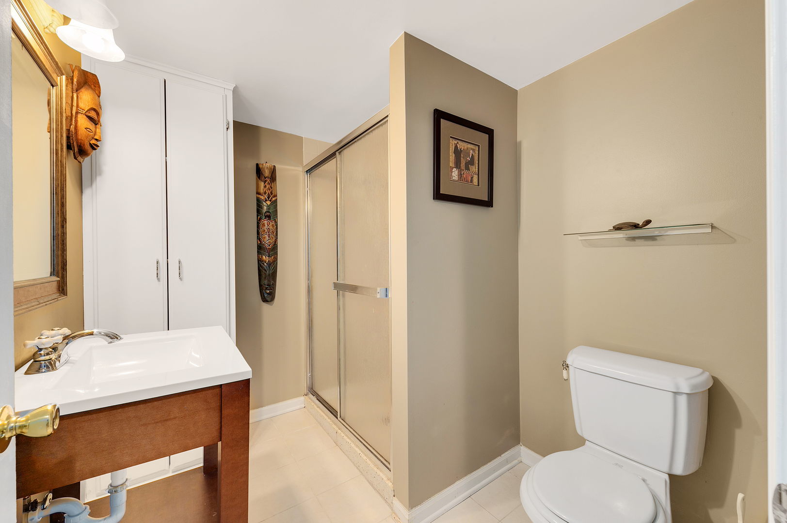 2S567 White Birch Lane Wheaton, IL 60189 - Photo 23 of 31 a bathroom with a toilet sink and a mirror