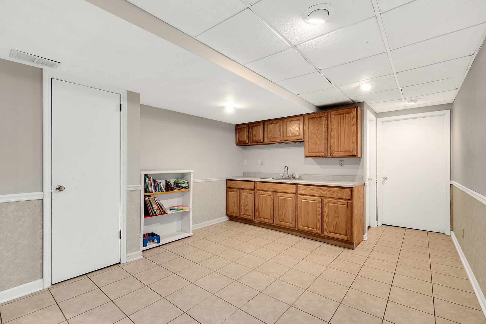 2S567 White Birch Lane Wheaton, IL 60189 - Photo 25 of 31 a large white kitchen with cabinets