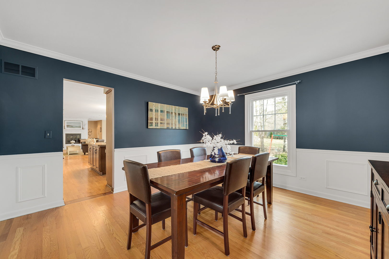 2S567 White Birch Lane Wheaton, IL 60189 - Photo 6 of 31 a view of a dining room with furniture window and wooden floor
