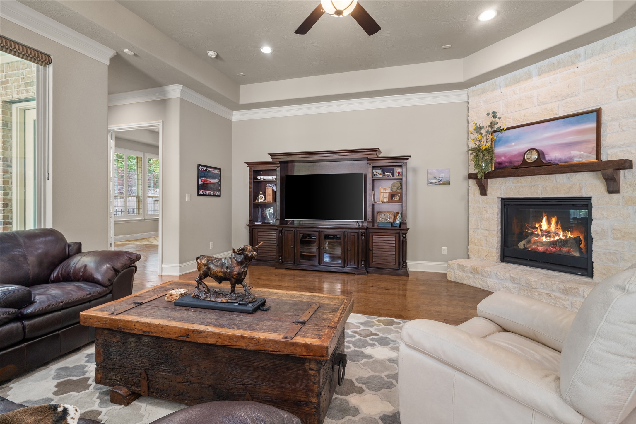 19813 Cullen Ridge Drive Porter, TX 77365 - Photo 19 of 44 Aa cozy fireplace and a spacious wall.... ideal for your dream entertainment center.
