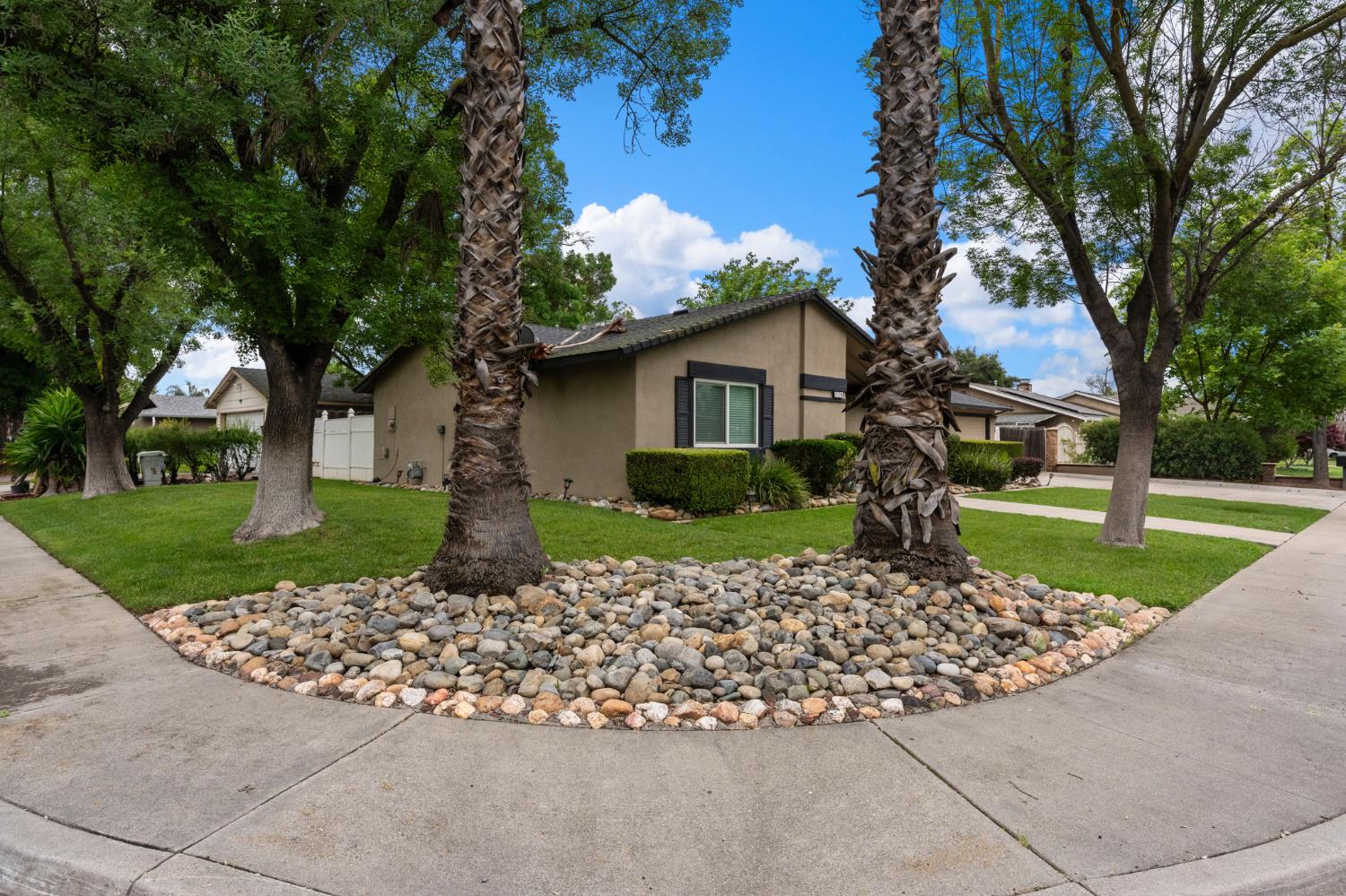 1120 Shasta Avenue Modesto, CA 95358 - Photo 3 of 35 a front view of a house with a yard
