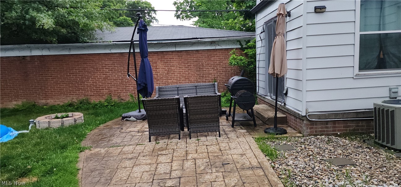 2164 Fenwick Road Cleveland, OH 44118 - Photo 2 of 4 View of patio with central air condition unit