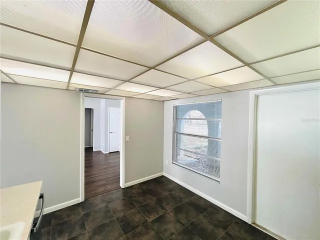 an empty room with windows