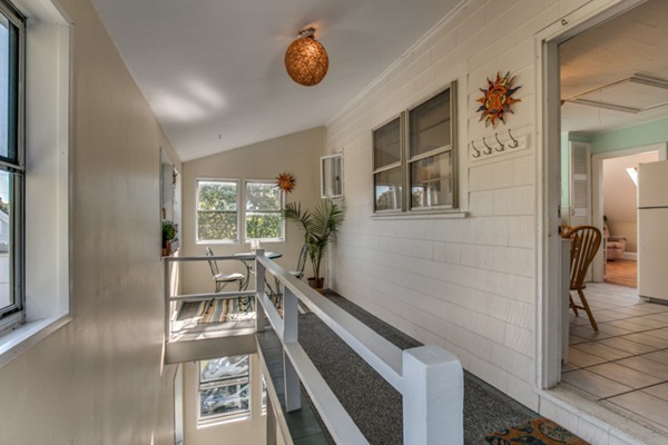 37 Wellman Street, Unit 3 Beverly, MA 01915 - Photo 11 of 21 workspace with wooden floor outdoor seating and entryway