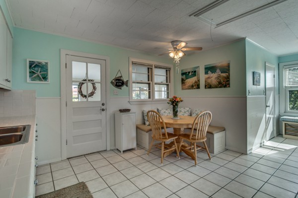 37 Wellman Street, Unit 3 Beverly, MA 01915 - Photo 9 of 21 a dining room with furniture and window