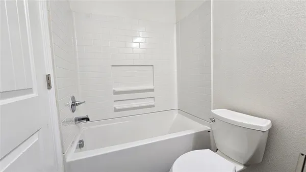 a view of a backyard with plants