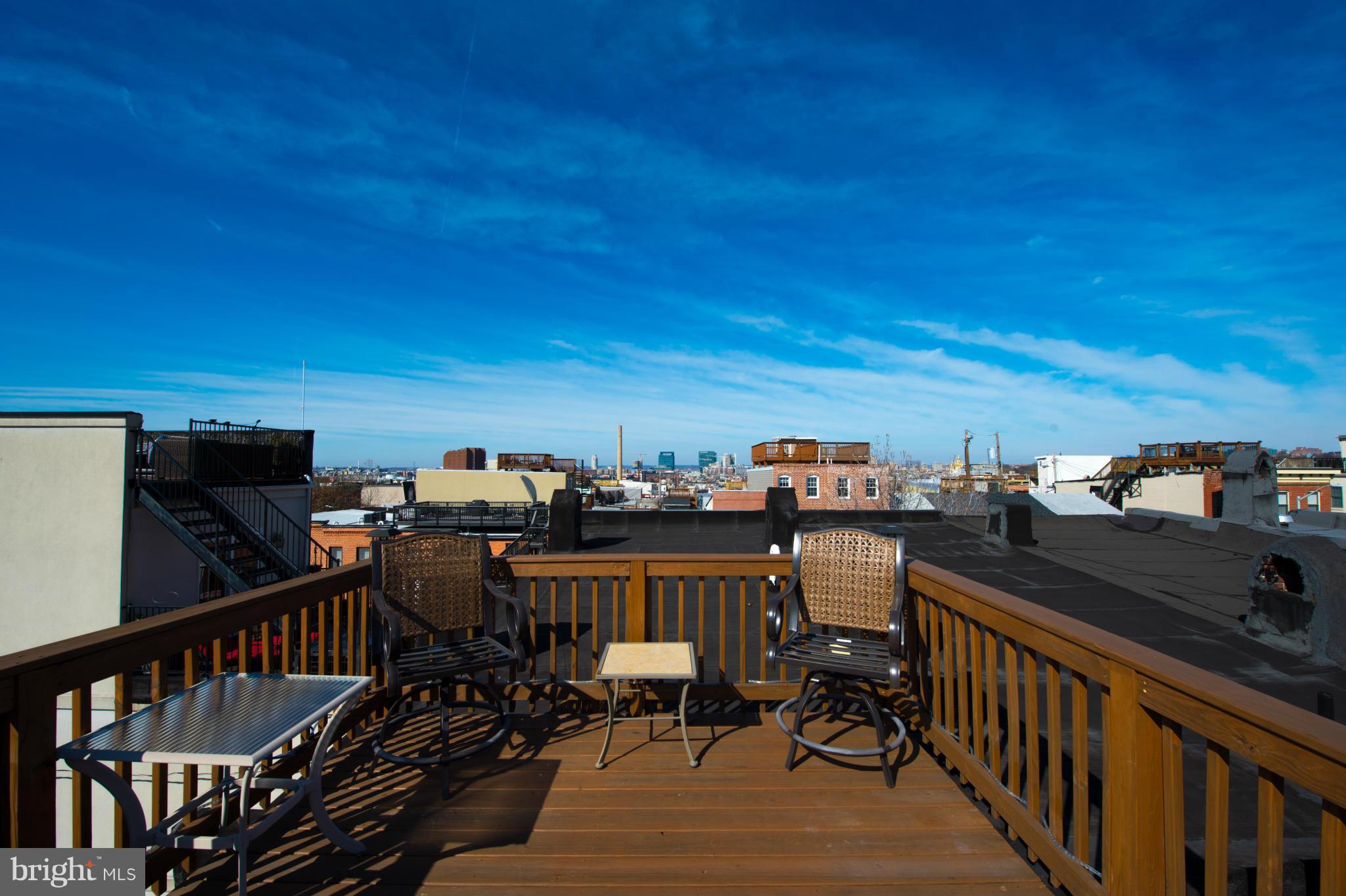 819 South Potomac Street Baltimore, MD 21224 - Photo 24 of 30 a view of a balcony with chairs