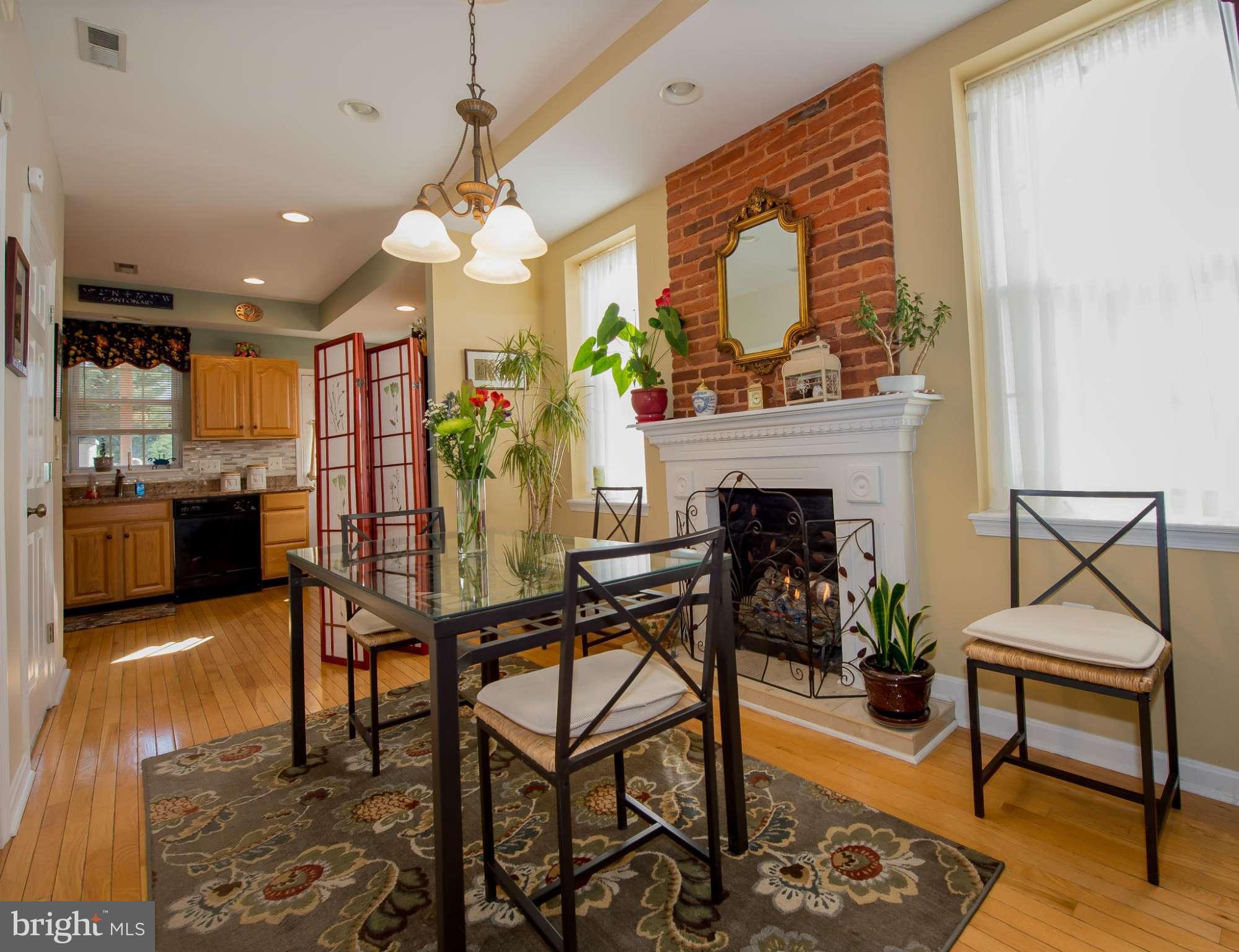 819 South Potomac Street Baltimore, MD 21224 - Photo 5 of 30 a view of a livingroom with furniture and a fireplace