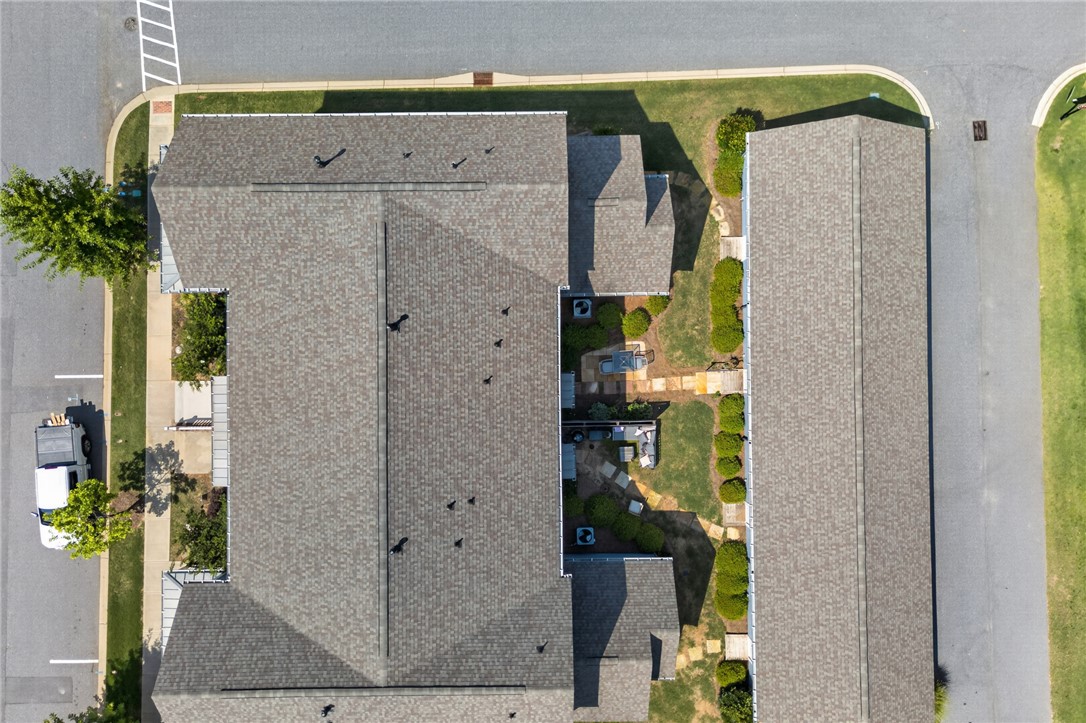 112 Tuttle Street Clemson, SC 29631 - Photo 29 of 46 An aerial perspective reveals a community layout with manicured green spaces and inviting outdoor entertaining areas.