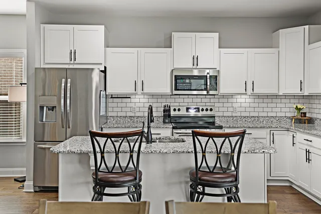 a view of a patio with a yard