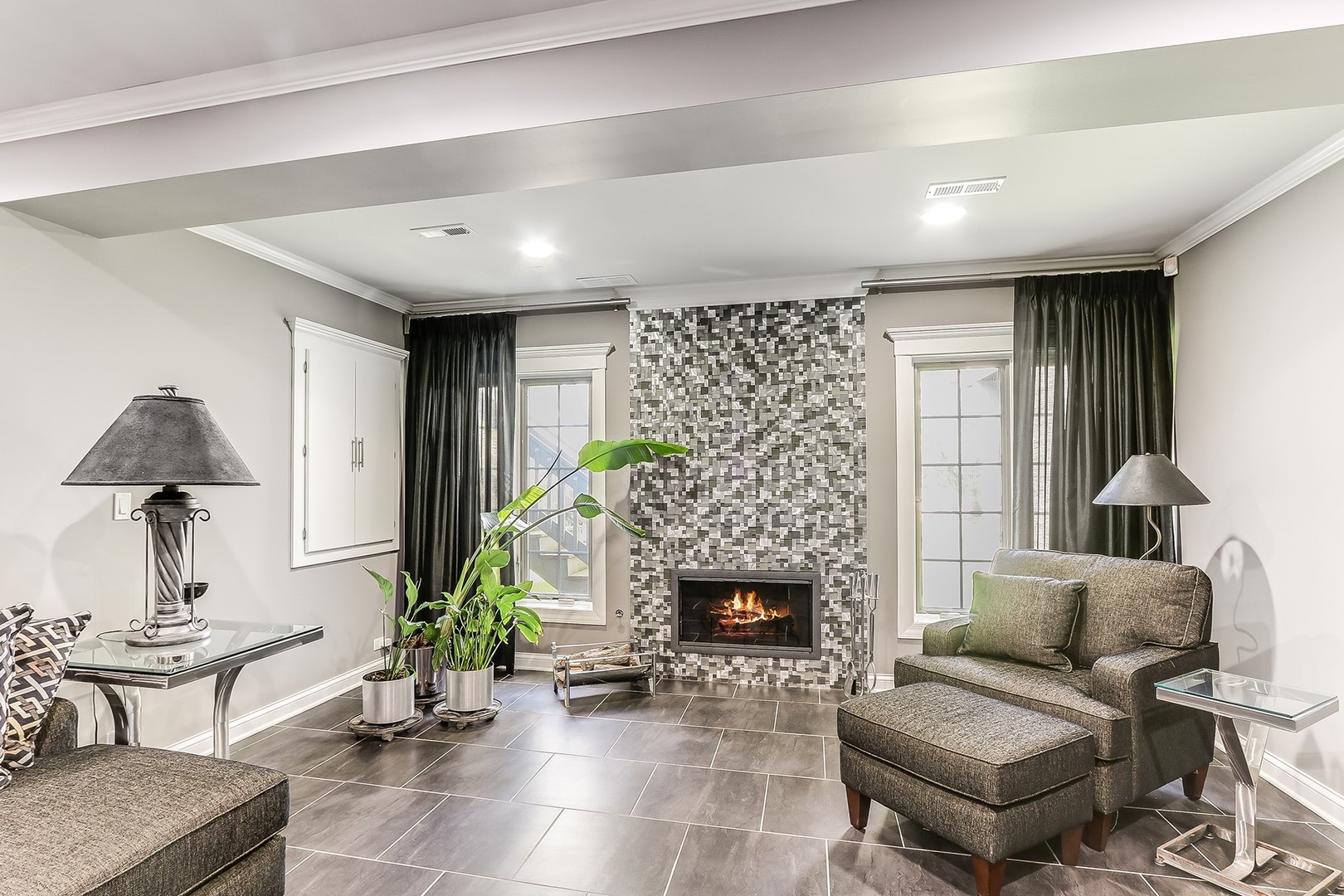 1839 Rizzi Lane Bartlett, IL 60103 - Photo 12 of 50 a living room with furniture and a fireplace