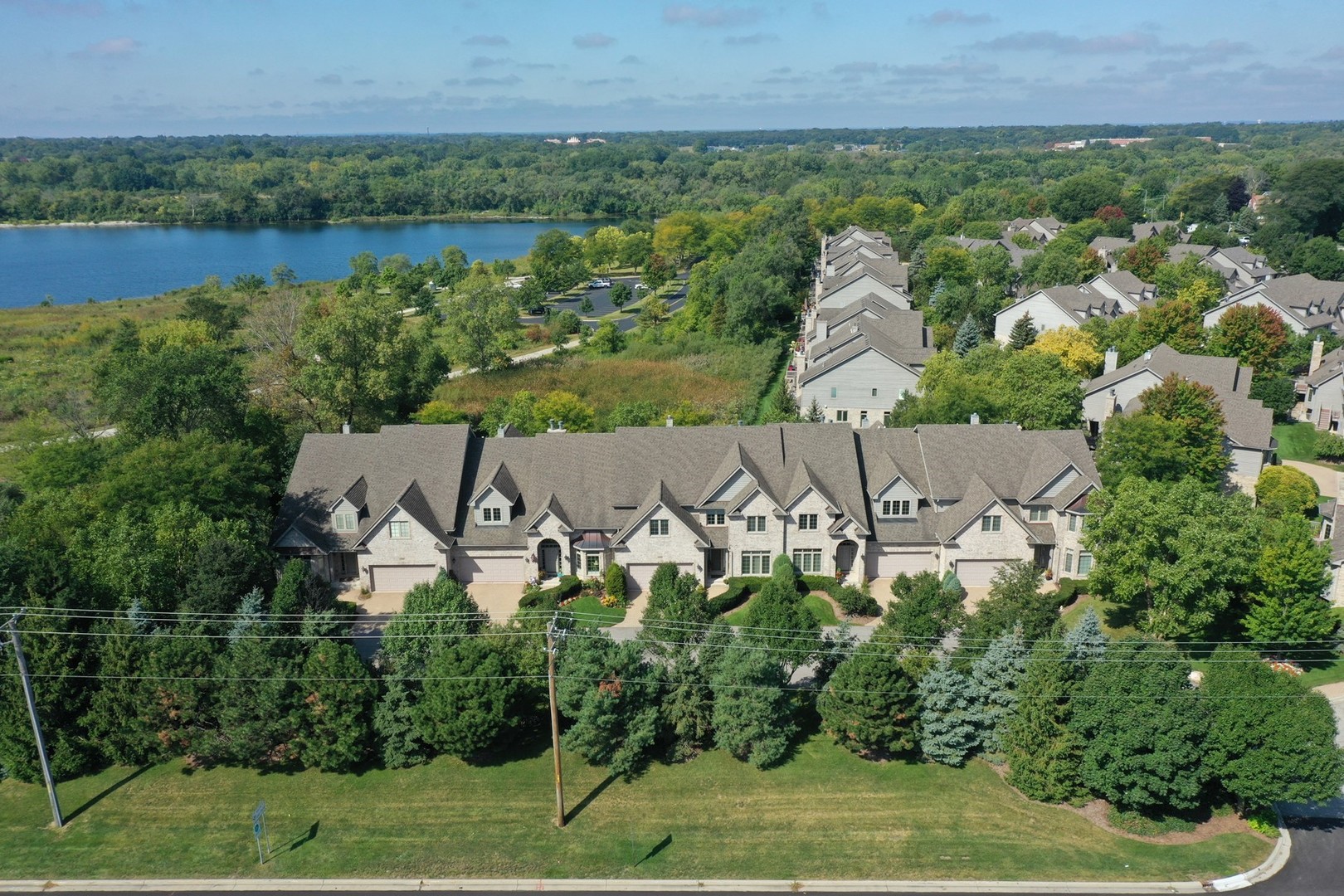 1839 Rizzi Lane Bartlett, IL 60103 - Photo 2 of 50 an aerial view of a house with a garden and a yard