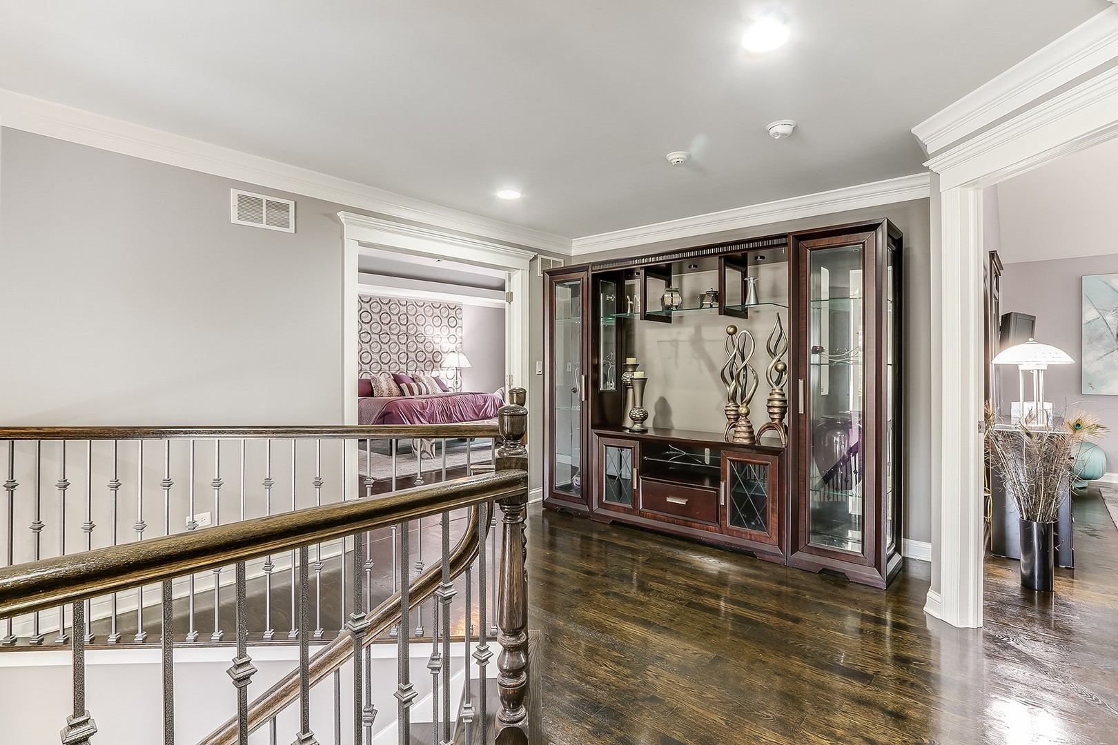 1839 Rizzi Lane Bartlett, IL 60103 - Photo 22 of 50 a view of a room with furniture window and wooden floor