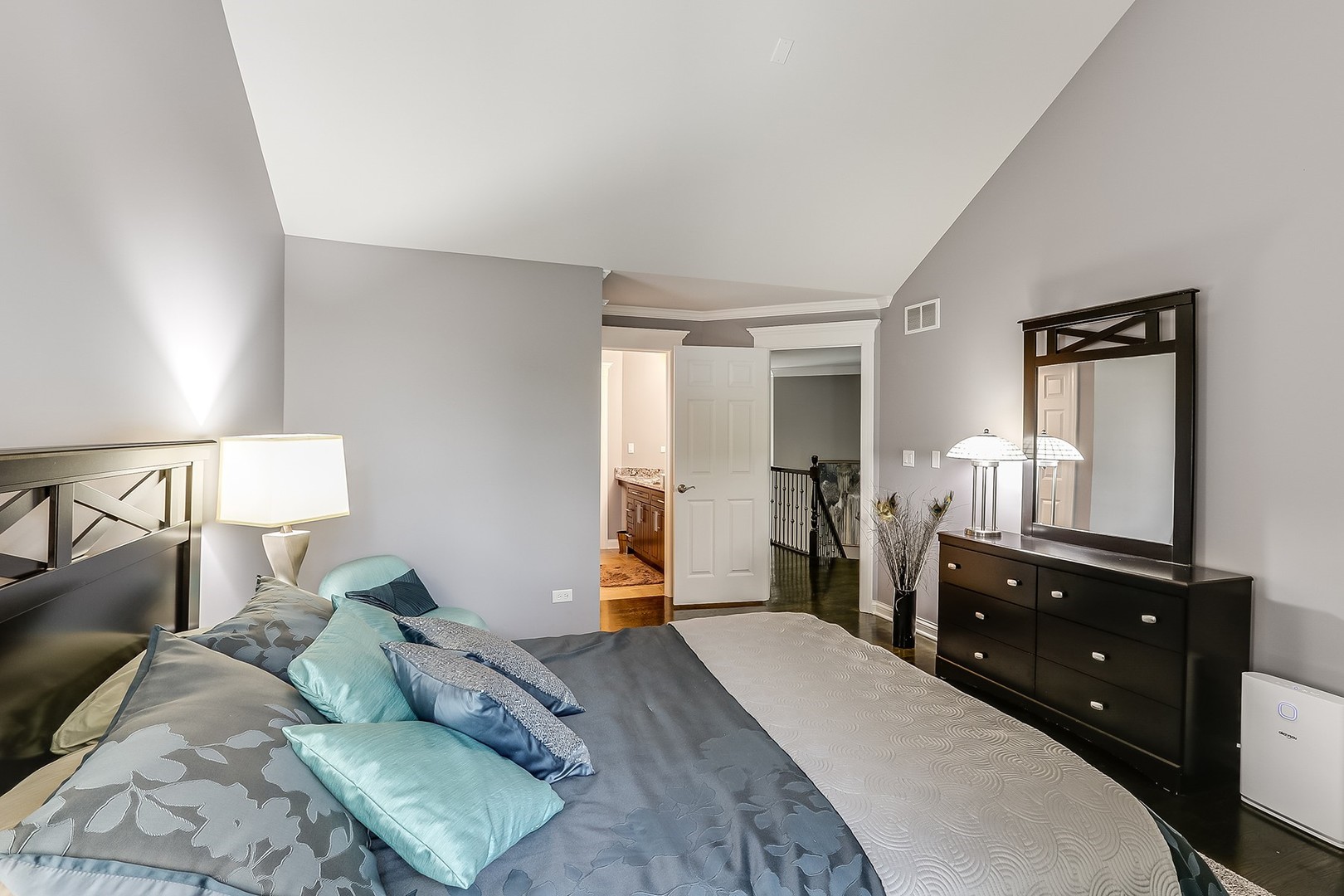 1839 Rizzi Lane Bartlett, IL 60103 - Photo 31 of 50 a bedroom with a bed and a dresser