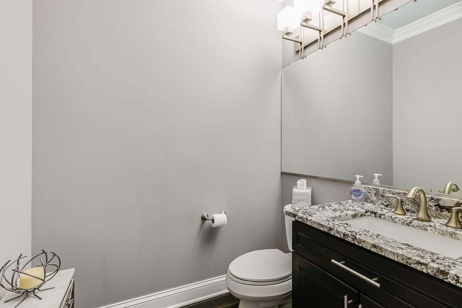 1839 Rizzi Lane Bartlett, IL 60103 - Photo 40 of 50 a bathroom with a granite countertop sink toilet and a mirror