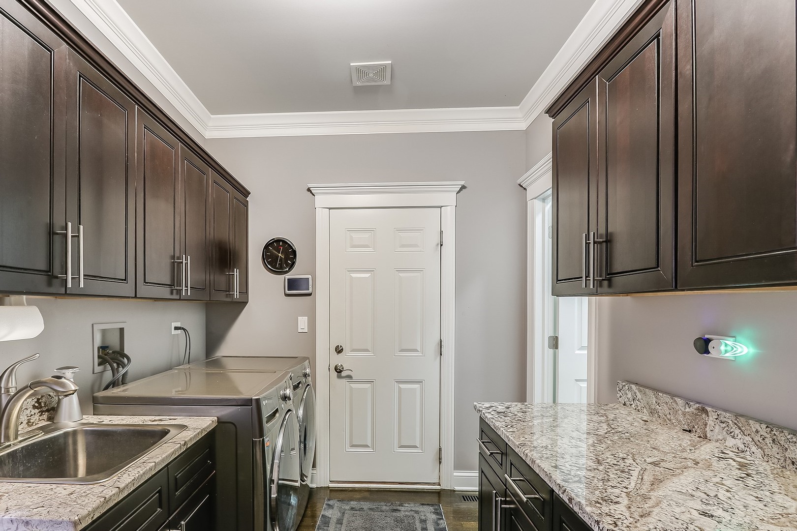 1839 Rizzi Lane Bartlett, IL 60103 - Photo 41 of 50 a kitchen with a sink stove and cabinets