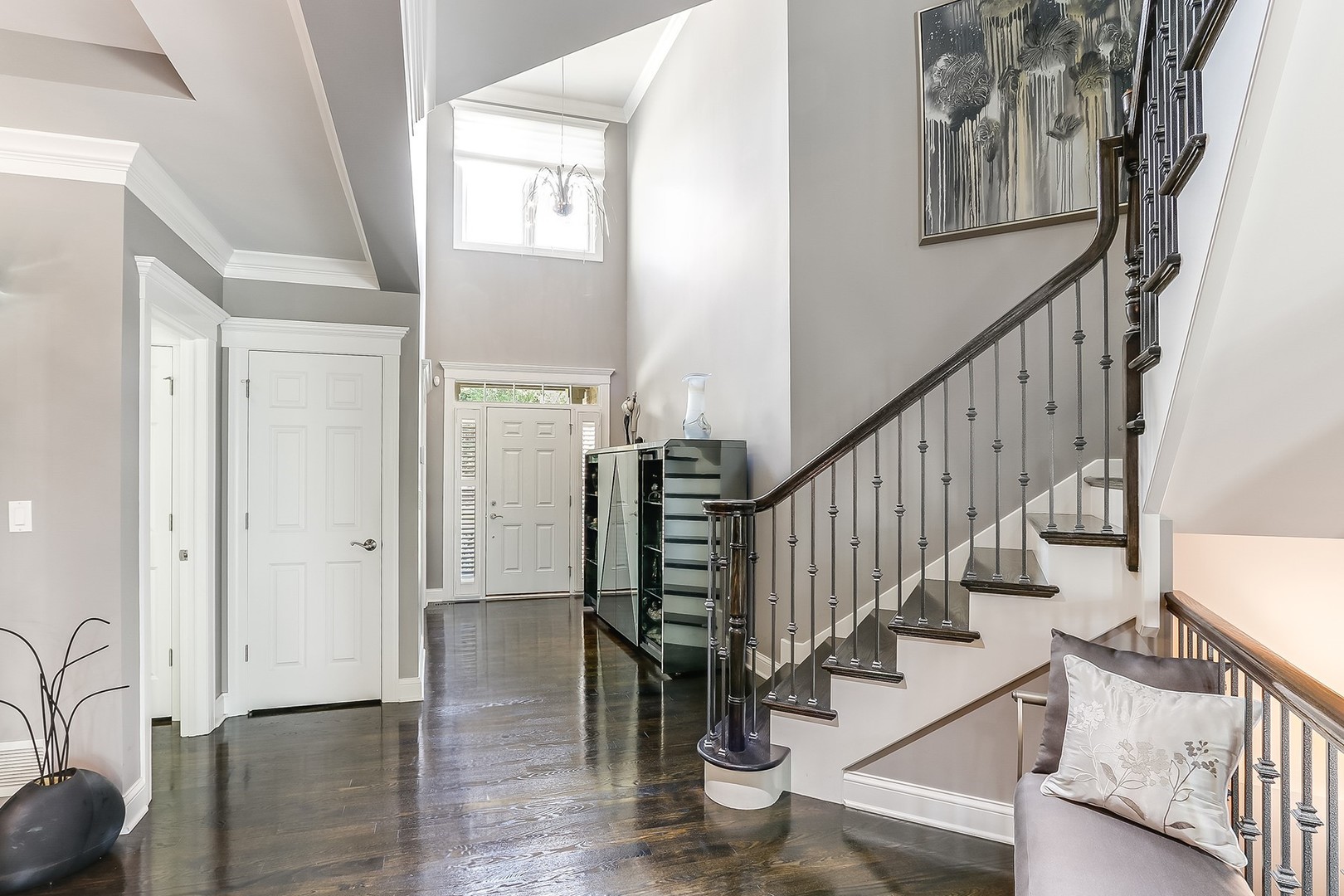 1839 Rizzi Lane Bartlett, IL 60103 - Photo 5 of 50 a view of entryway with wooden floor and stairs