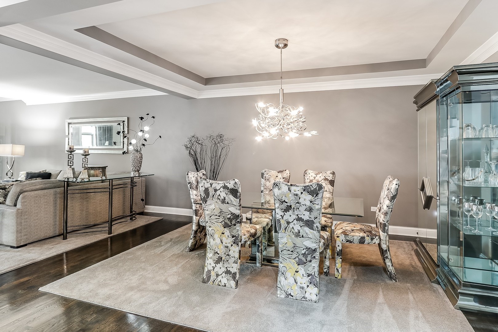 1839 Rizzi Lane Bartlett, IL 60103 - Photo 7 of 50 a very nice looking dining room with furniture a chandelier and wooden floor