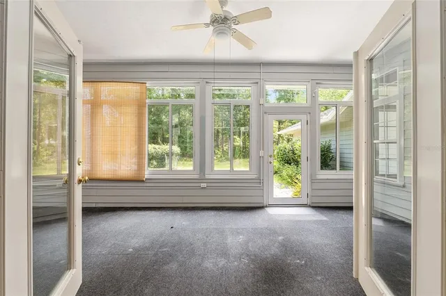 an empty room with windows