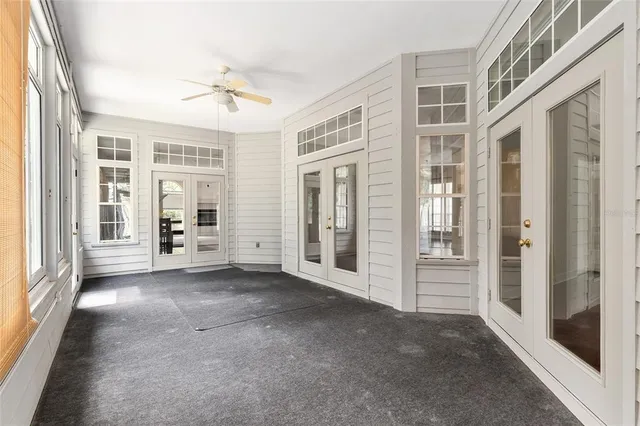 a view of a house with sitting area and garden