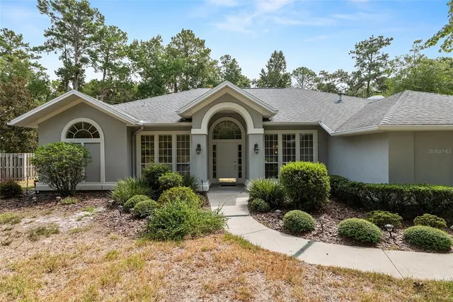 a front view of a house with a porch