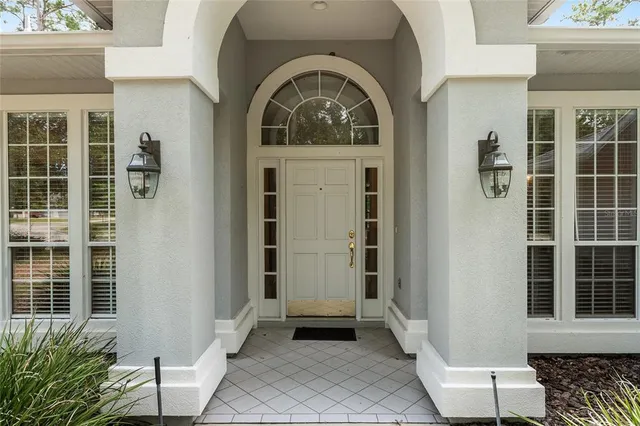 a kitchen with granite countertop a sink and a window