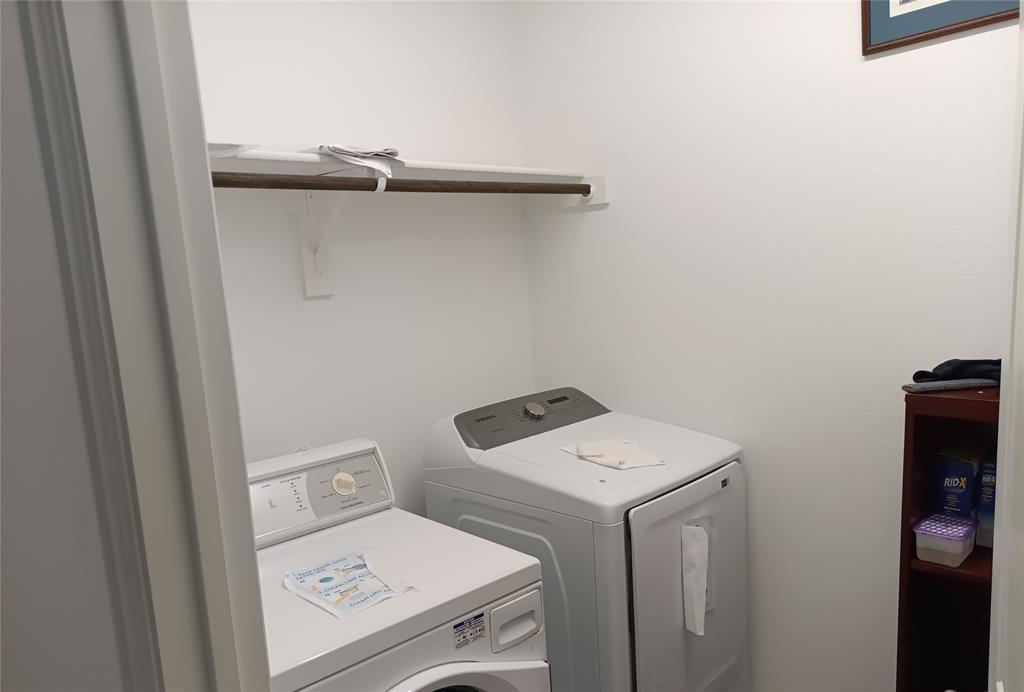 505 Virginia Way Princeton, TX 75407 - Photo 17 of 22 a utility room with dryer and washer