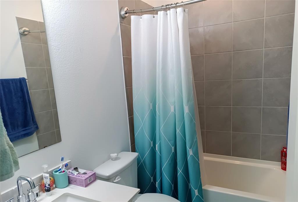 505 Virginia Way Princeton, TX 75407 - Photo 22 of 22 a bathroom with a bathtub a sink and toilet