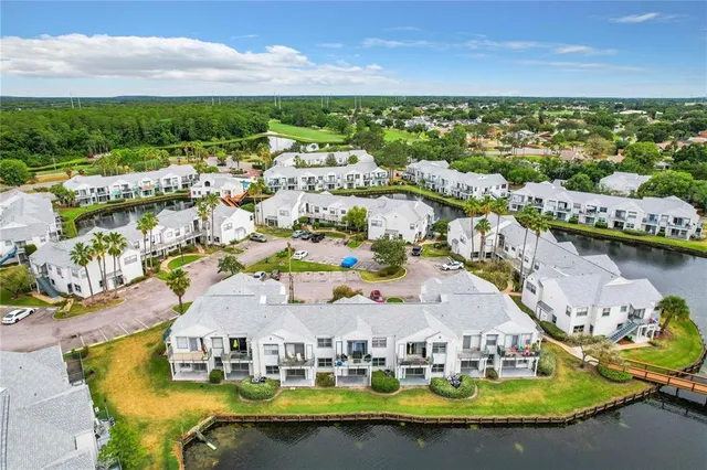 a view of houses with outdoor space and swimming pool