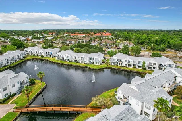 a view of a city with a lake