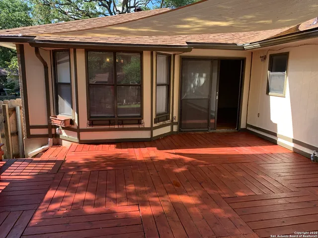 a view of a backyard of the house