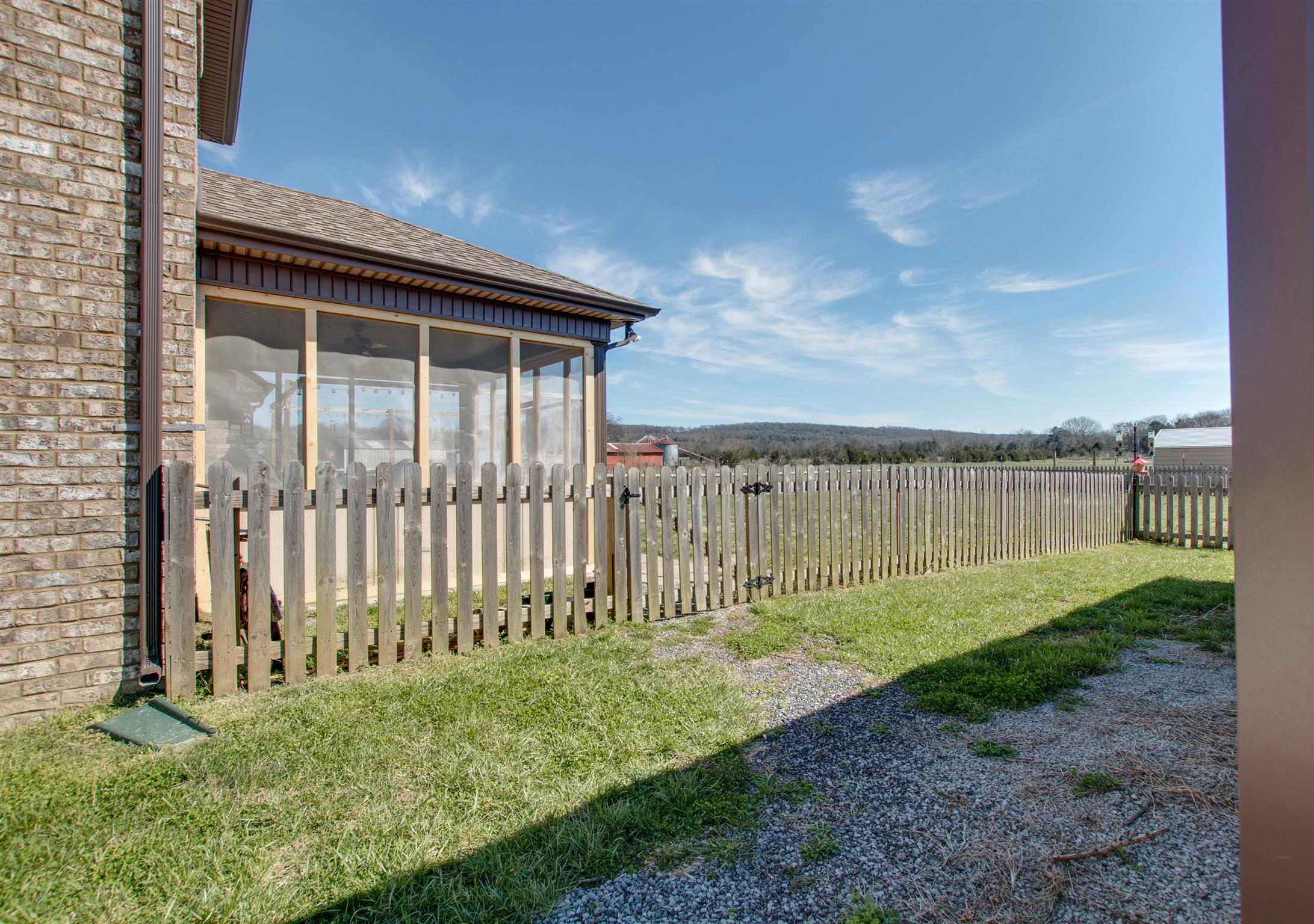 10436 Valley View Road Lascassas, TN 37085 - Photo 22 of 29 View of the covered and screened in porch and smaller fenced in yard