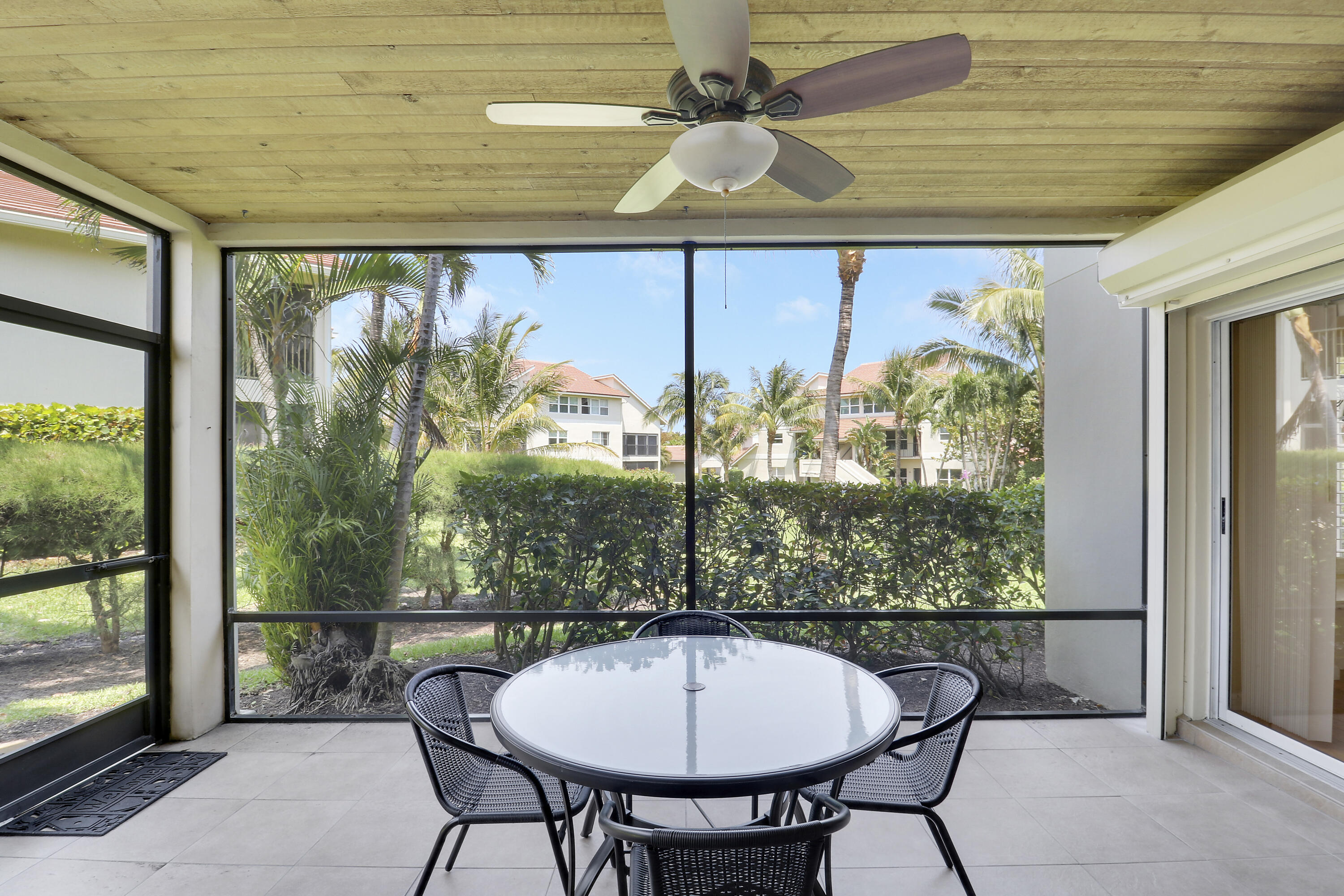 4161 U.S. Highway 1, Unit C2 Jupiter, FL 33477 - Photo 22 of 57 a view of a dining room with furniture window and outside view