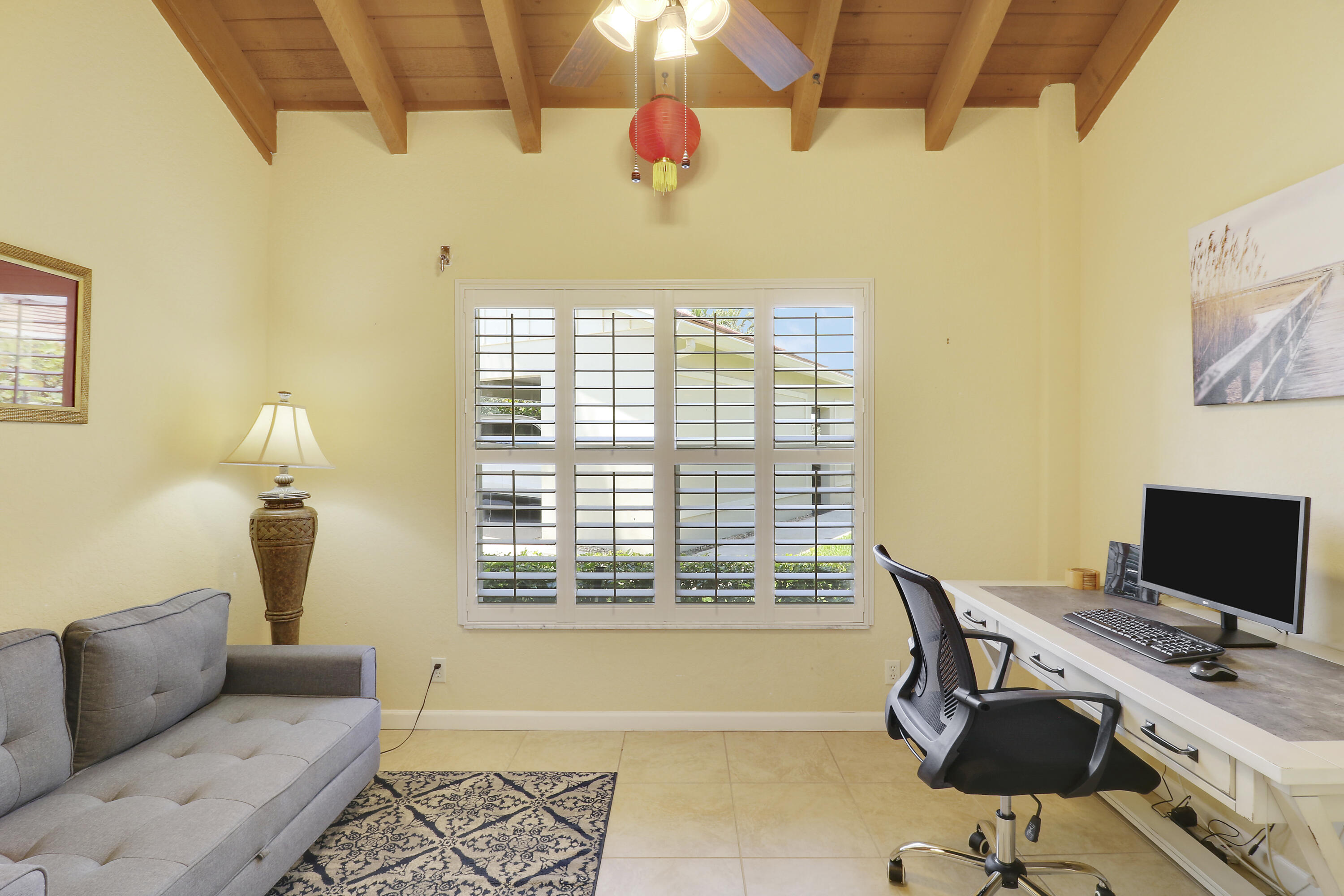 4161 U.S. Highway 1, Unit C2 Jupiter, FL 33477 - Photo 26 of 57 a workspace with furniture and a window