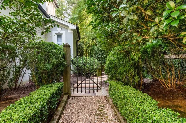 a kitchen with stainless steel appliances granite countertop a stove and a refrigerator