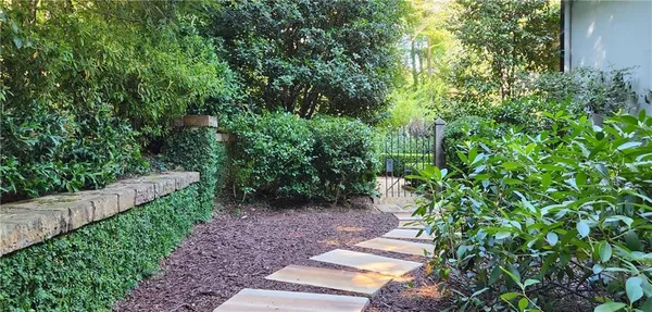 a stove top oven sitting inside of a kitchen