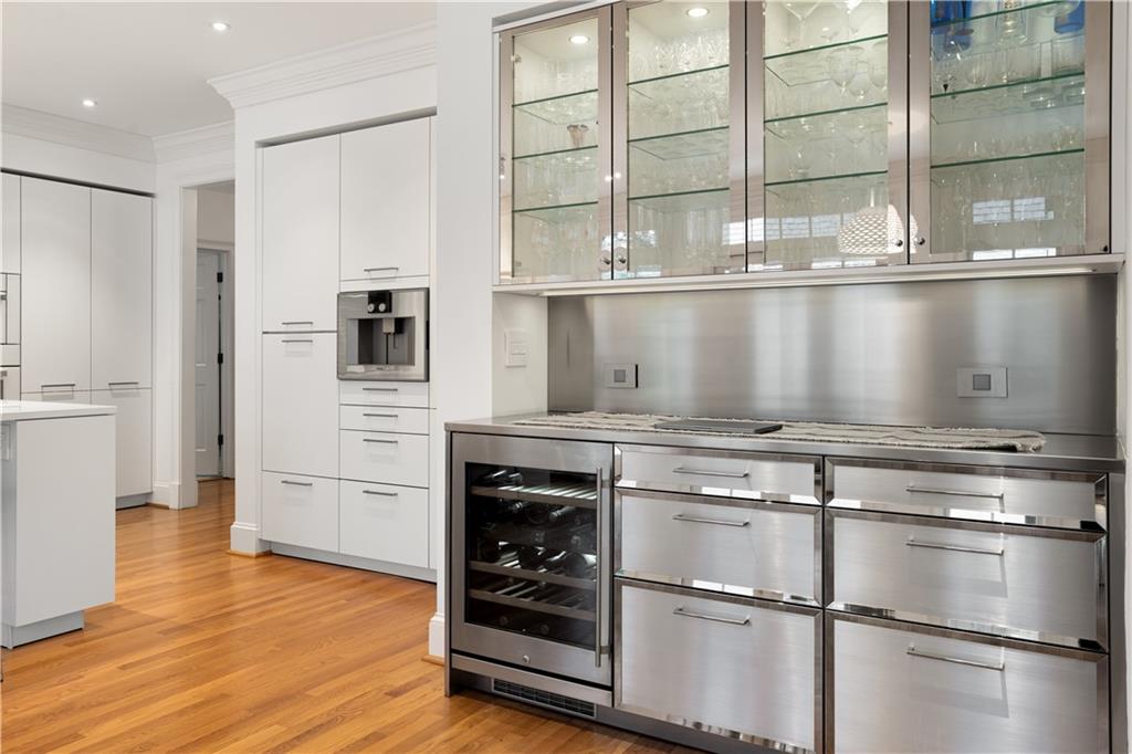 4224 East Conway Drive Northwest Atlanta, GA 30327 - Photo 29 of 72 a kitchen with stainless steel appliances granite countertop a stove and a refrigerator