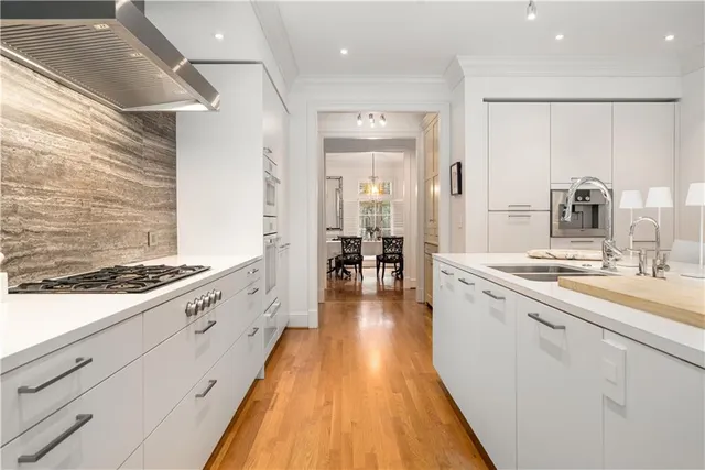 a view of a dining room with furniture and window
