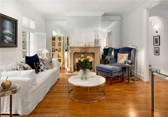 a bedroom with furniture and a window