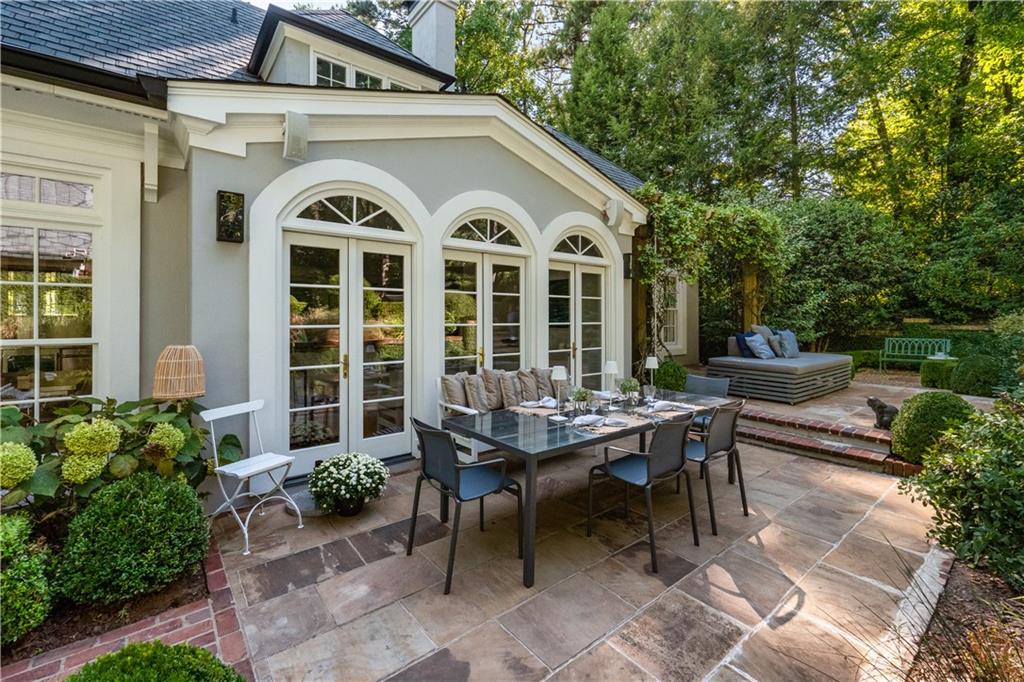 4224 East Conway Drive Northwest Atlanta, GA 30327 - Photo 8 of 72 a view of a dinning table and chairs in the patio