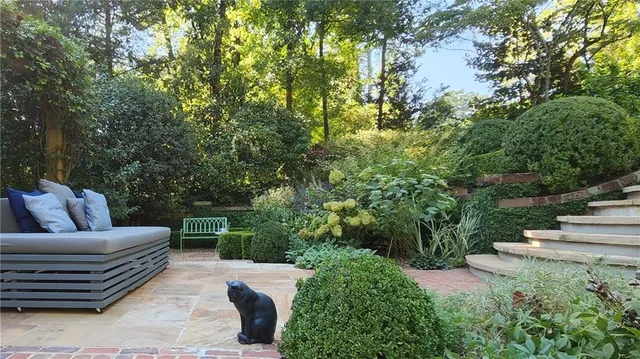 a view of a patio with swimming pool