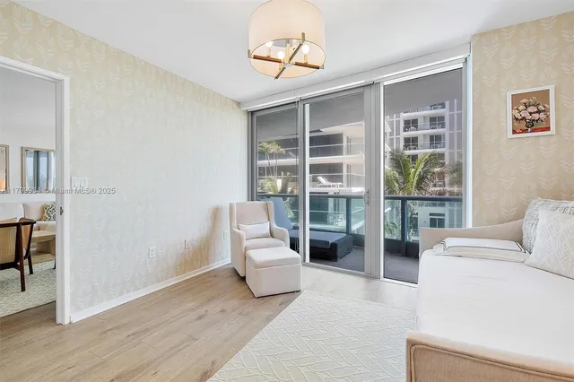 a bedroom with a bed and a mirror